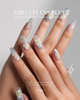 Bora Bora Blue medium coffin press-ons with curved light flow and tropical floral accents