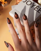 Bourbon press on nails in warm brown glossy jelly with a hand-drawn gold chrome outline - image 4