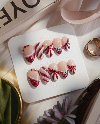 Broadway Rouge nails in extra short almond — Festive Red & White