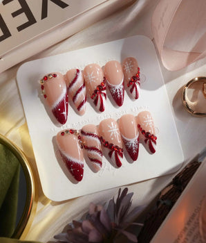 Broadway Rouge nails in medium stiletto — Festive Red & White