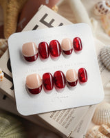 Brocade extra short oval press-on nails with deep red and burgundy fall nail art