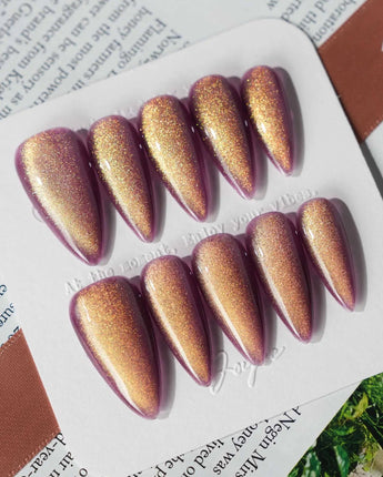 Brown Acrylic Cat-eye in medium stiletto shape with berry brown magnetic glow