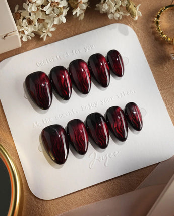 Burn press-on nails — Dark Red Cat Eye, Flowing Flame Texture. handmade nail art by Joyee Nails