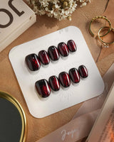 Burn press-on nails — Dark Red Cat Eye, Flowing Flame Texture. handmade nail art by Joyee Nails