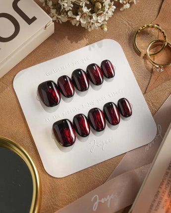 Burn press-on nails — Dark Red Cat Eye, Flowing Flame Texture. handmade nail art by Joyee Nails