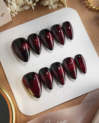 Burn press-on nails — Dark Red Cat Eye, Flowing Flame Texture. handmade nail art by Joyee Nails
