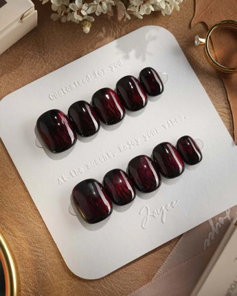Burn press-on nails — Dark Red Cat Eye, Flowing Flame Texture. handmade nail art by Joyee Nails