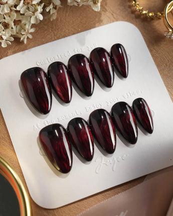 Burn press-on nails — Dark Red Cat Eye, Flowing Flame Texture. handmade nail art by Joyee Nails