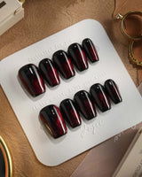 Burn press-on nails — Dark Red Cat Eye, Flowing Flame Texture. handmade nail art by Joyee Nails