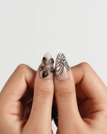 Butterfly Effect nails in medium almond — Neutral Nude & Black,