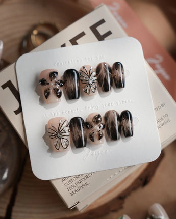Butterfly Effect nails in short coffin — Neutral Nude & Black,