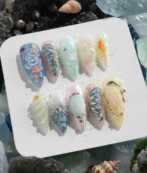 Como Blue Lake Como nails with water ripples, koi fish, feathers, and dew-like pearls