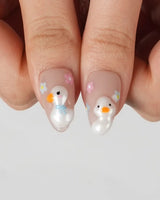 Call Duck Tutu duck-inspired press-on nails with polka dots and glossy gel