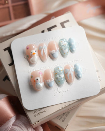 Call Duck Tutu extra short almond press-on nails with tiny duck and pearl details