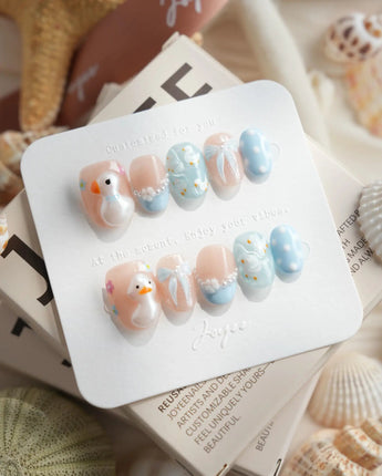 Call Duck Tutu extra short oval press-on nails with glossy duck-themed art