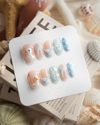 Call Duck Tutu short oval press-on nails with soft blue duck nail art