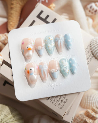Call Duck Tutu short stiletto press-on nails with duckling charms and jelly shine