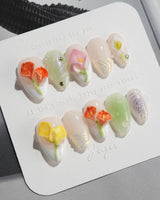 CallaLily-Dewy Vibe press-on nails in extra short almond shape — Fresh Macarons, 3D Calla Lilies & Aurora Shell Textures.