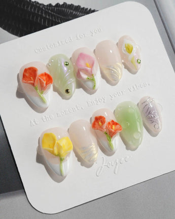 CallaLily-Dewy Vibe press-on nails in extra short almond shape — Fresh Macarons, 3D Calla Lilies & Aurora Shell Textures.