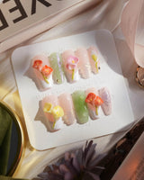CallaLily-Dewy Vibe press-on nails in medium coffin shape — Fresh Macarons, 3D Calla Lilies & Aurora Shell Textures.