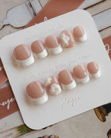 Camellia-Classy AF press-on nails in extra short squoval shape — Nude Pink, White French Tips & 3D Camellias