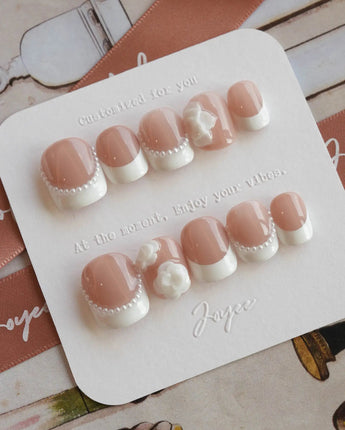 Camellia-Classy AF press-on nails in extra short squoval shape — Nude Pink, White French Tips & 3D Camellias