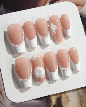 Camellia-Classy AF press-on nails in medium coffin shape — Nude Pink, White French Tips & 3D Camellias