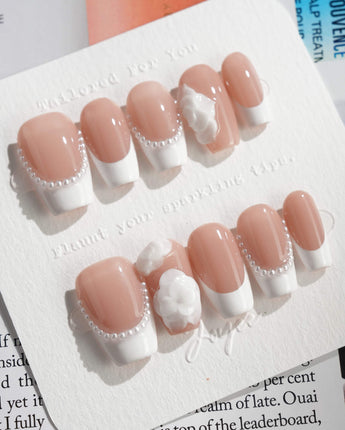 Camellia-Classy AF press-on nails in short coffin shape — Nude Pink, White French Tips & 3D Camellias