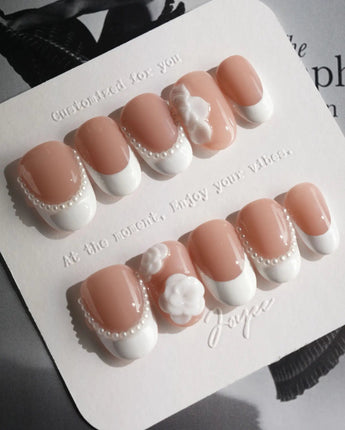 Camellia-Classy AF press-on nails in short oval shape — Nude Pink, White French Tips & 3D Camellias