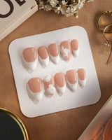 Camellia-Classy AF press-on nails in short stiletto shape — Nude Pink, White French Tips & 3D Camellias