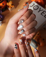 Candy Bucket press on nails with a 3D jack-o'-lantern, puffy 3D ghosts, bats and silver stars on an aurora finish with orange edges - image 3