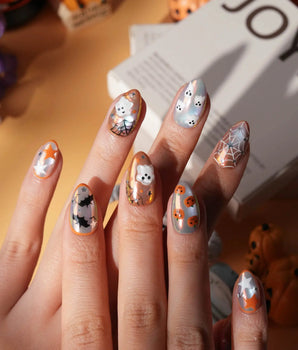 Candy Bucket press on nails with a 3D jack-o'-lantern, puffy 3D ghosts, bats and silver stars on an aurora finish with orange edges - image 1