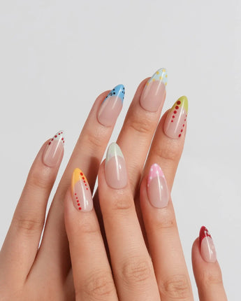 Candy Dot short almond press-on nails with warm nude base and candy-color tips