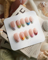 Candy Dot extra short almond press-on nails with colorful dotted French tips