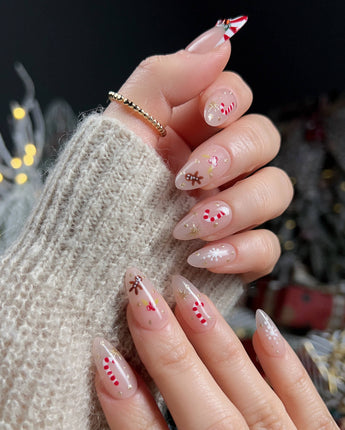 Candy Holiday press-on nails — Festive Christmas, Candy Canes & Gingerbread Man. handmade nail art by Joyee Nails