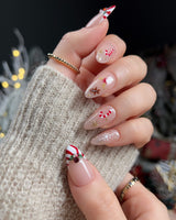 Candy Holiday press-on nail set — Festive Christmas, Candy Canes & Gingerbread Man. design, hand-painted with real gel polish