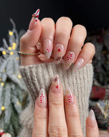 Candy Holiday nail art close-up showing Festive Christmas, Candy Canes & Gingerbread Man. details