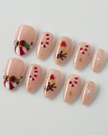 Candy Holiday press-on nails in extra short almond shape — Festive Christmas, Candy Canes & Gingerbread Man.