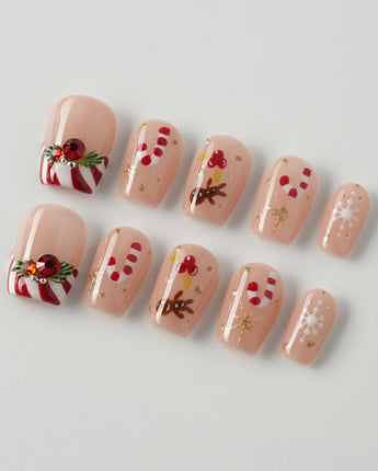 Candy Holiday press-on nails in extra short coffin shape — Festive Christmas, Candy Canes & Gingerbread Man.