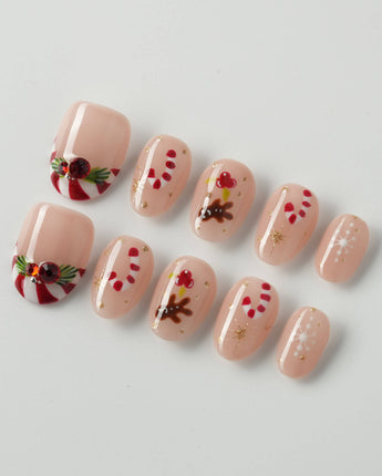 Candy Holiday press-on nails in extra short oval shape — Festive Christmas, Candy Canes & Gingerbread Man.