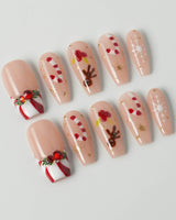 Candy Holiday press-on nails in medium coffin shape — Festive Christmas, Candy Canes & Gingerbread Man.