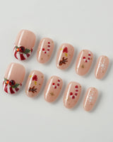 Candy Holiday press-on nails in short oval shape — Festive Christmas, Candy Canes & Gingerbread Man.