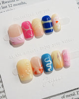 Candy Pop Colored press-on nails in extra short square shape — gradient multicolor abstract gloss nails