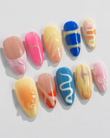 Candy Pop Colored press-on nails in medium almond shape — gradient multicolor abstract gloss nails