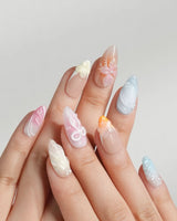 Candy Shore beach nails with soft pastel tides and sculpted shell details