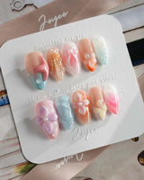 Candy Shore dream-island nails with soft pastel ocean style and raised sea details