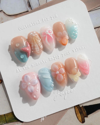 Candy Shore candyland beach nails with 3D shells, starfish, and soft pastel color