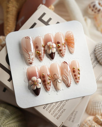 Caramel Cream in medium stiletto shape with caramel 3D flowers and gold wire accents