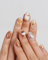 Caramel Miffy close-up of sculpted bunny nail art with whipped cream and chocolate drizzle
