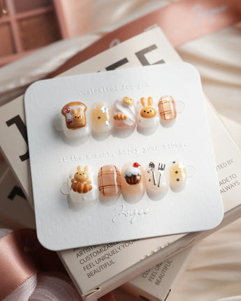 Caramel Miffy bunny dessert press-on nails in extra short squoval shape